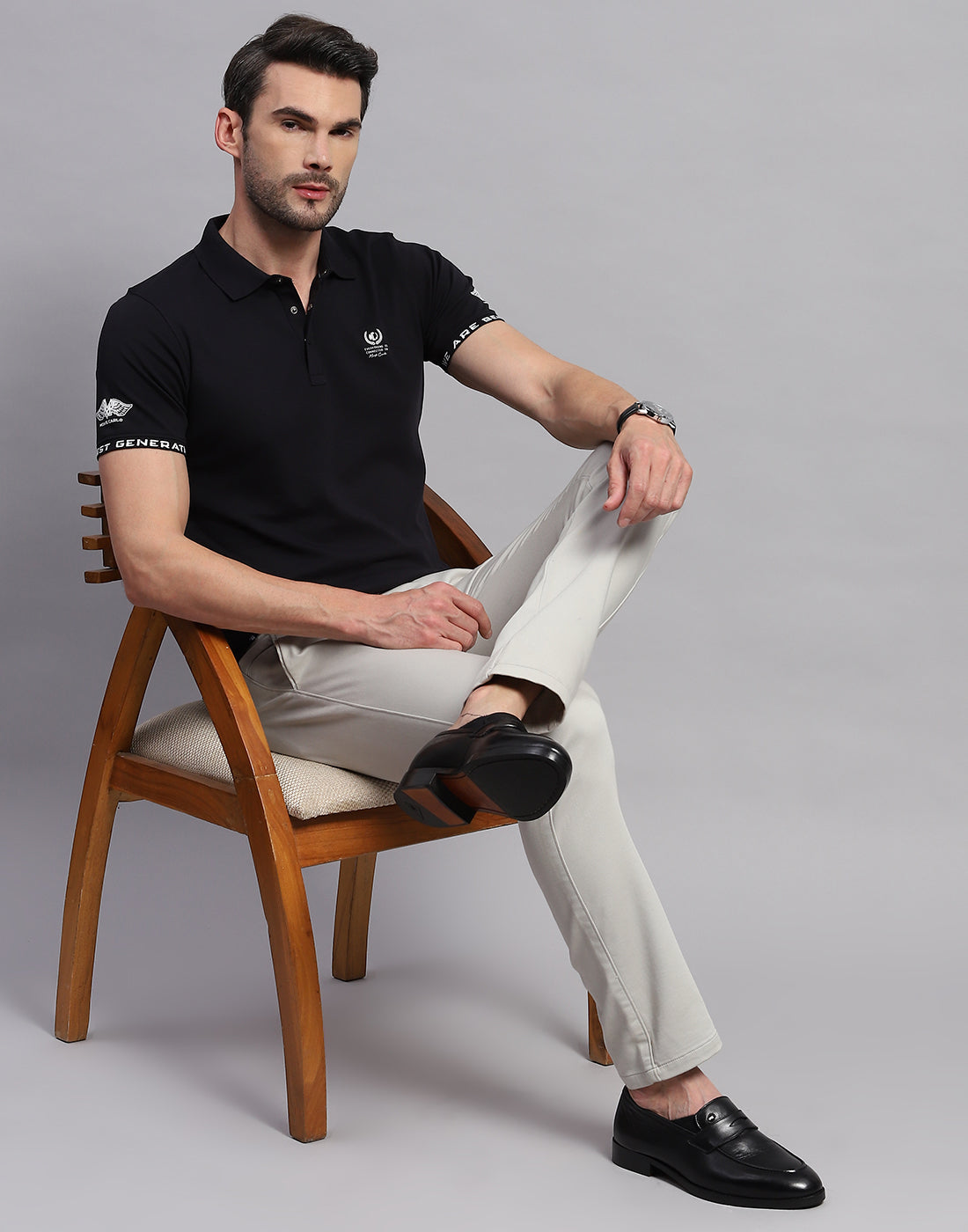 Men Black Solid Polo Collar Half Sleeve T-Shirt