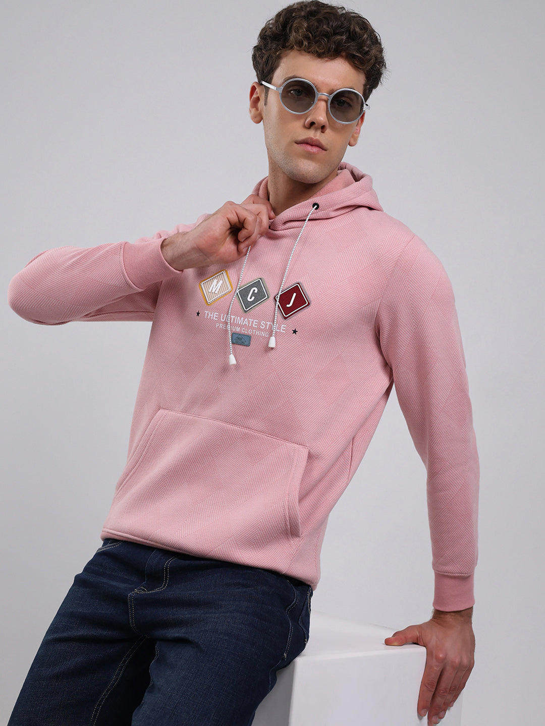 Men Peach Solid Hooded Full Sleeve Sweatshirt
