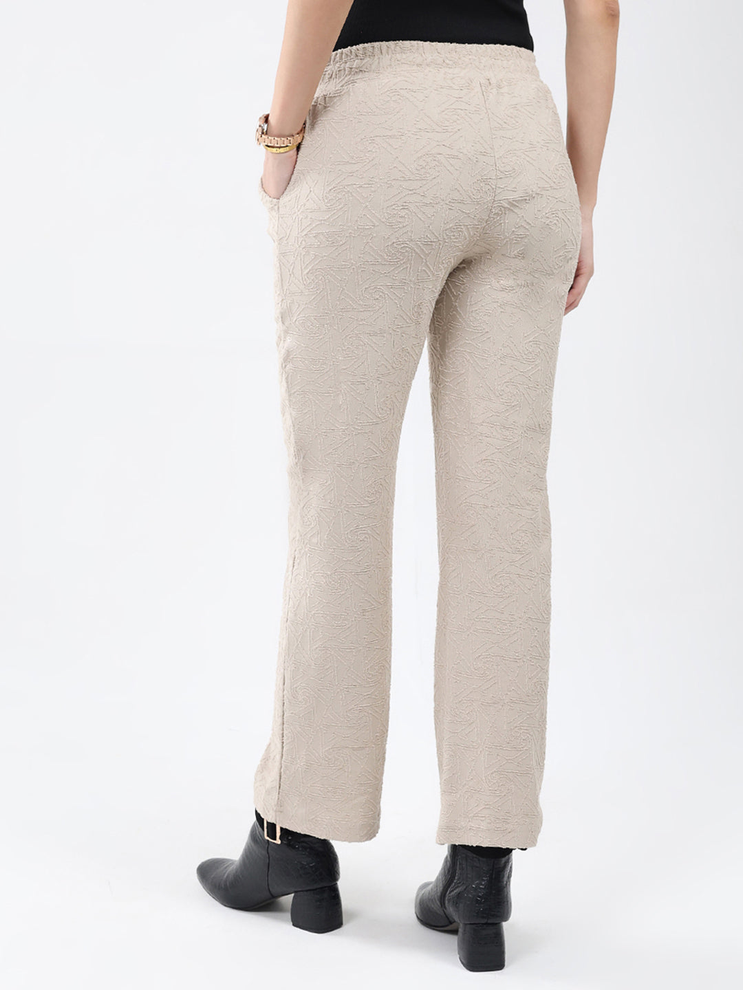 Women Beige Self Design Regular Fit Winter Lower