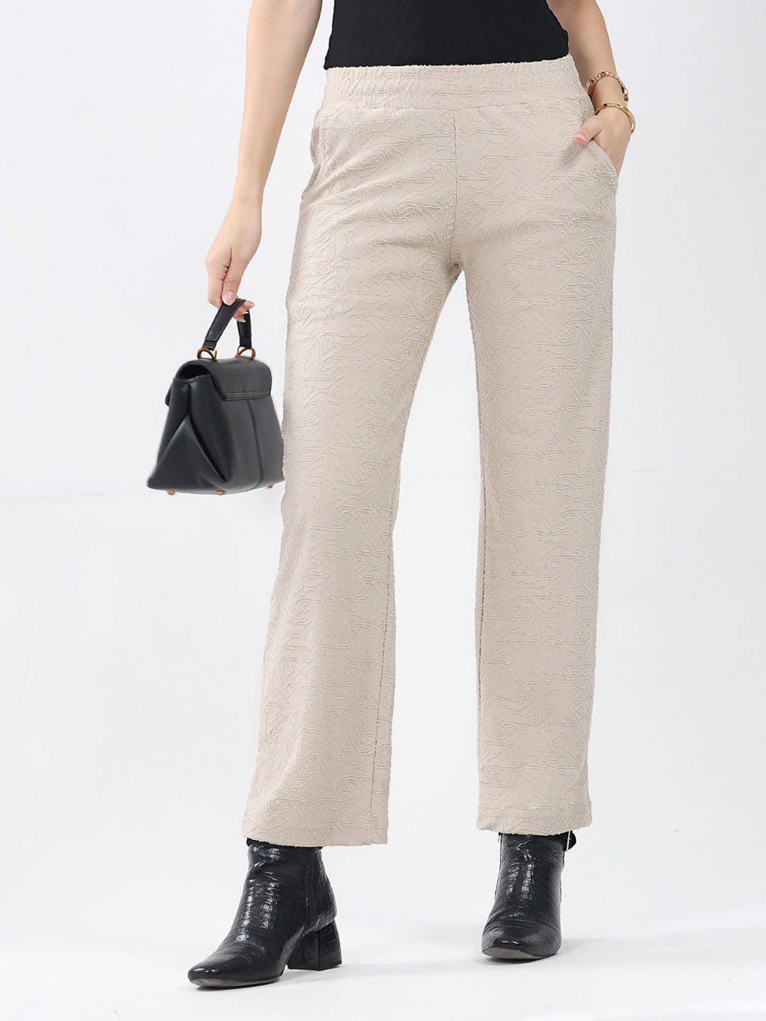 Women Beige Self Design Regular Fit Winter Lower