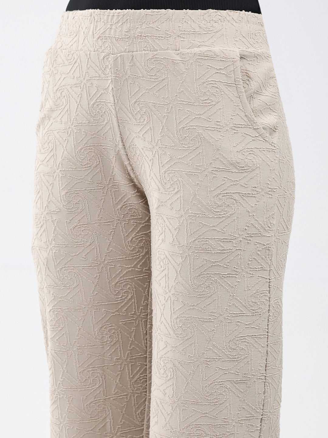 Women Beige Self Design Regular Fit Winter Lower