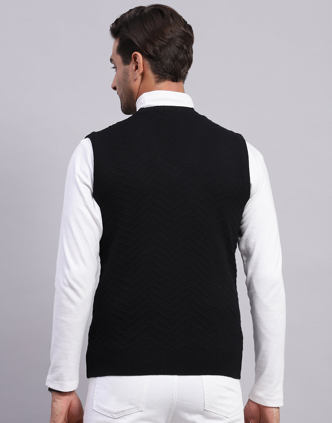 Men Black Self Design V Neck Sleeveless Sweater