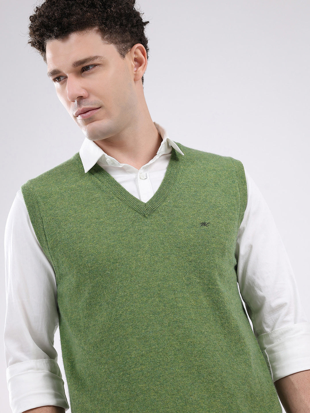 Men Green Solid V Neck Sleeveless Sweater
