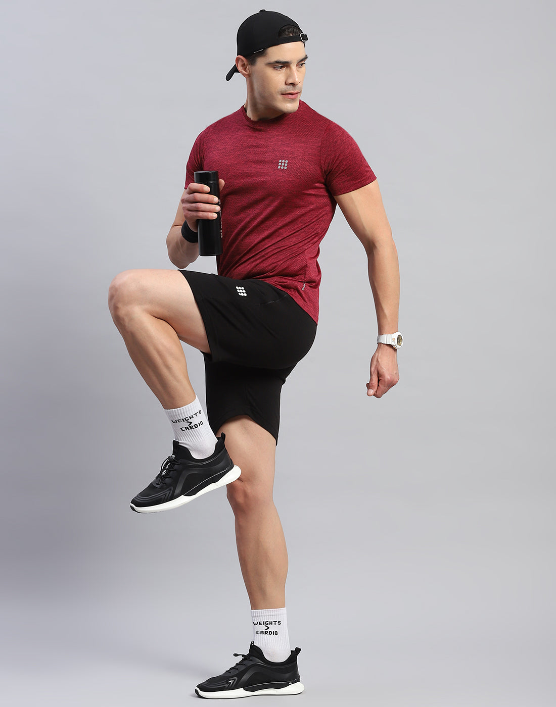 Men Maroon Self Design Round Neck Half Sleeve T-Shirt