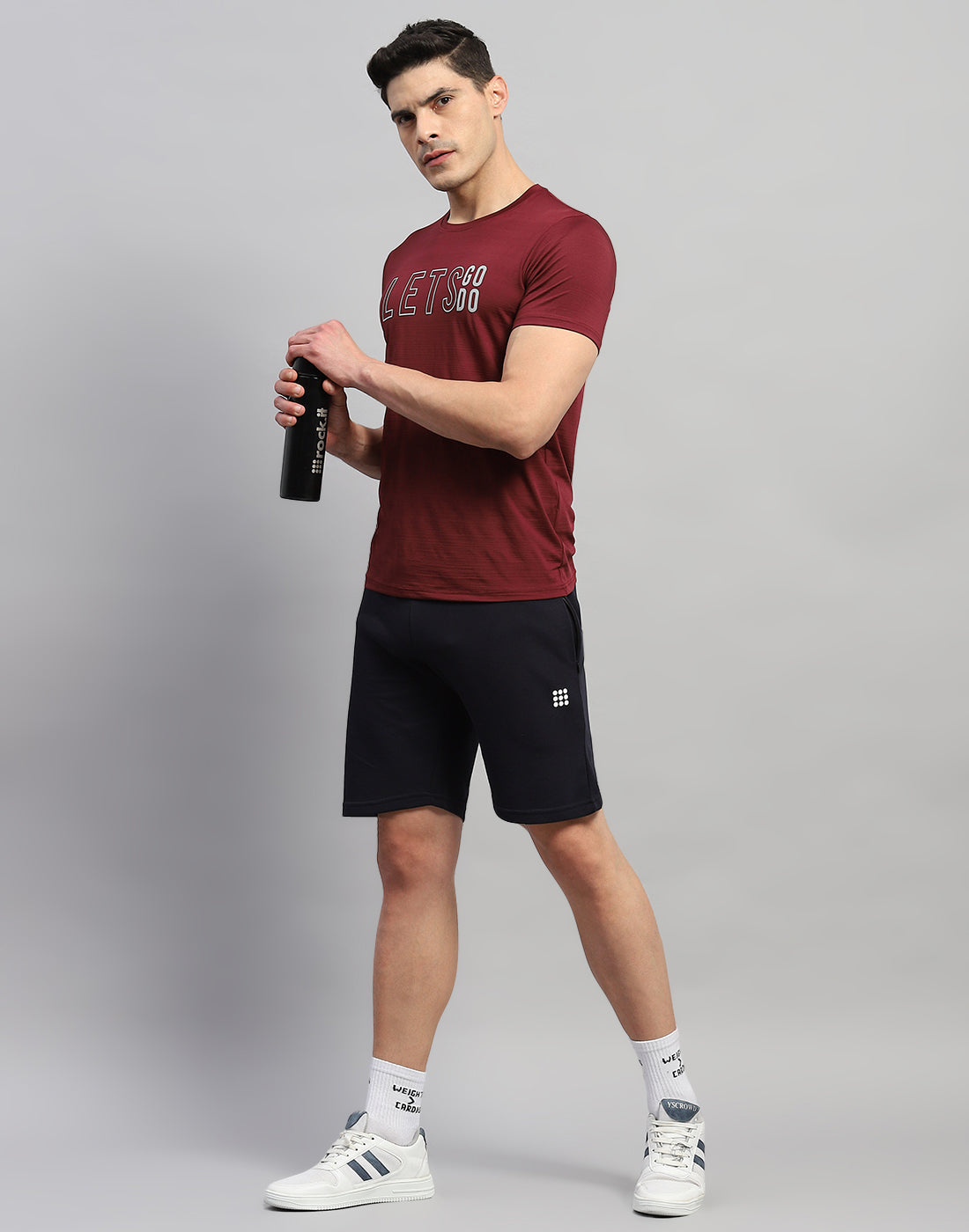 Men Maroon Self Design Round Neck Half Sleeve T-Shirt