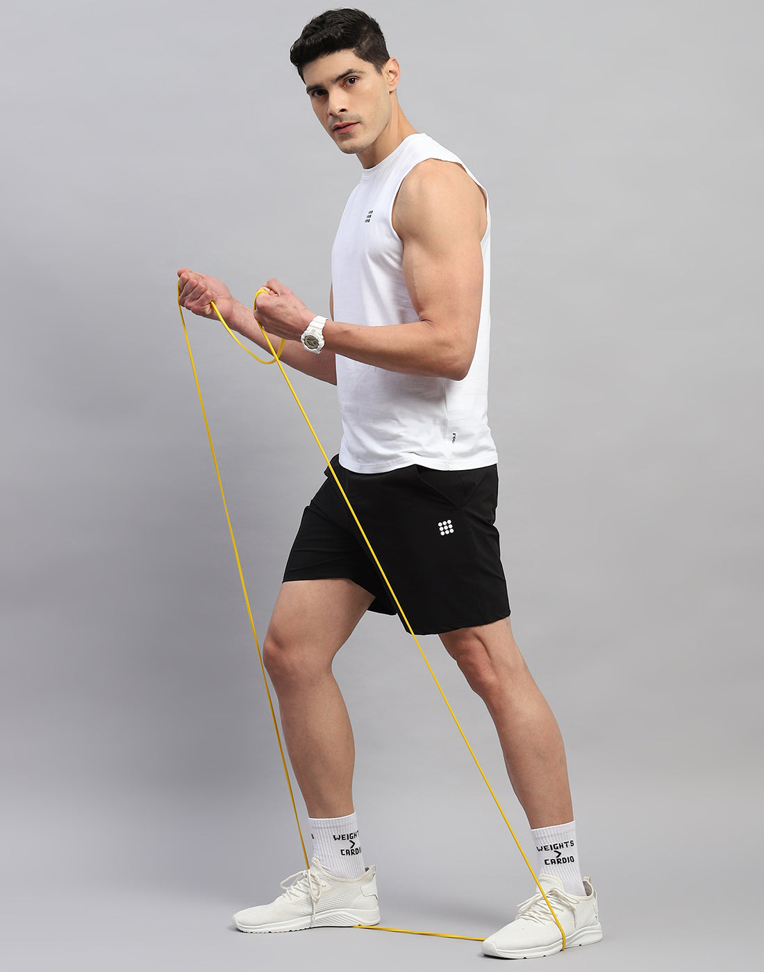 Men White Solid Round Neck Sleeveless T-Shirt