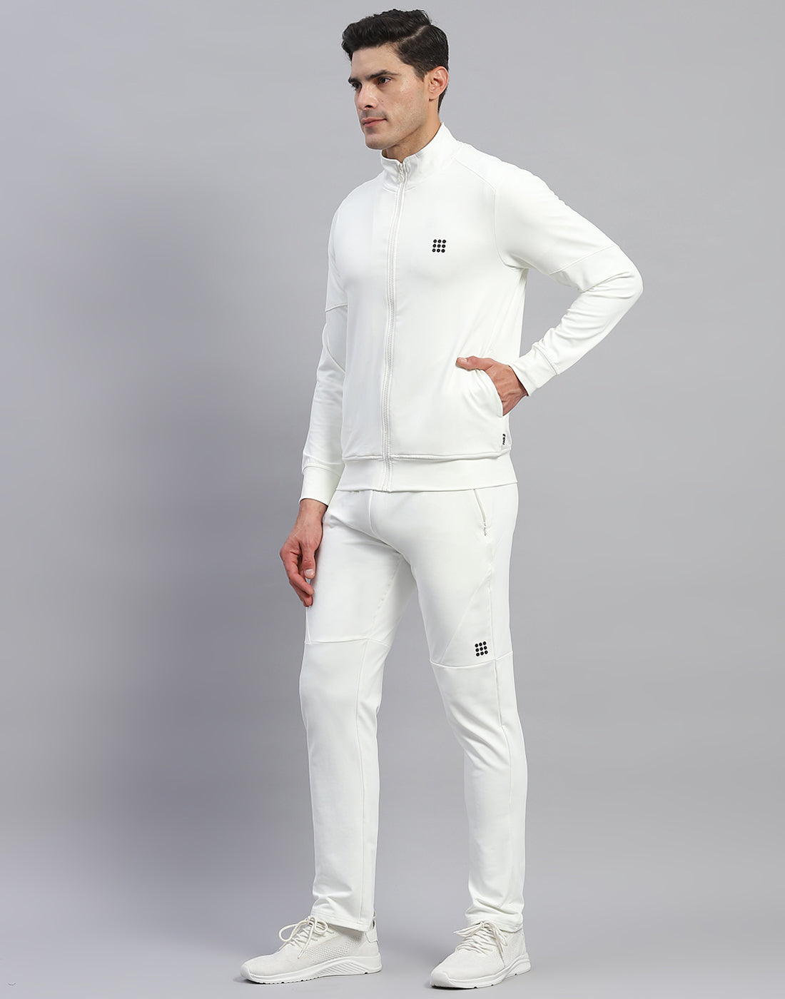 Men Cream Solid Round Neck Full Sleeve Tracksuit