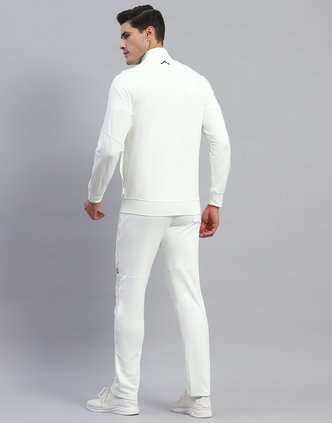 Men Cream Solid Round Neck Full Sleeve Tracksuit