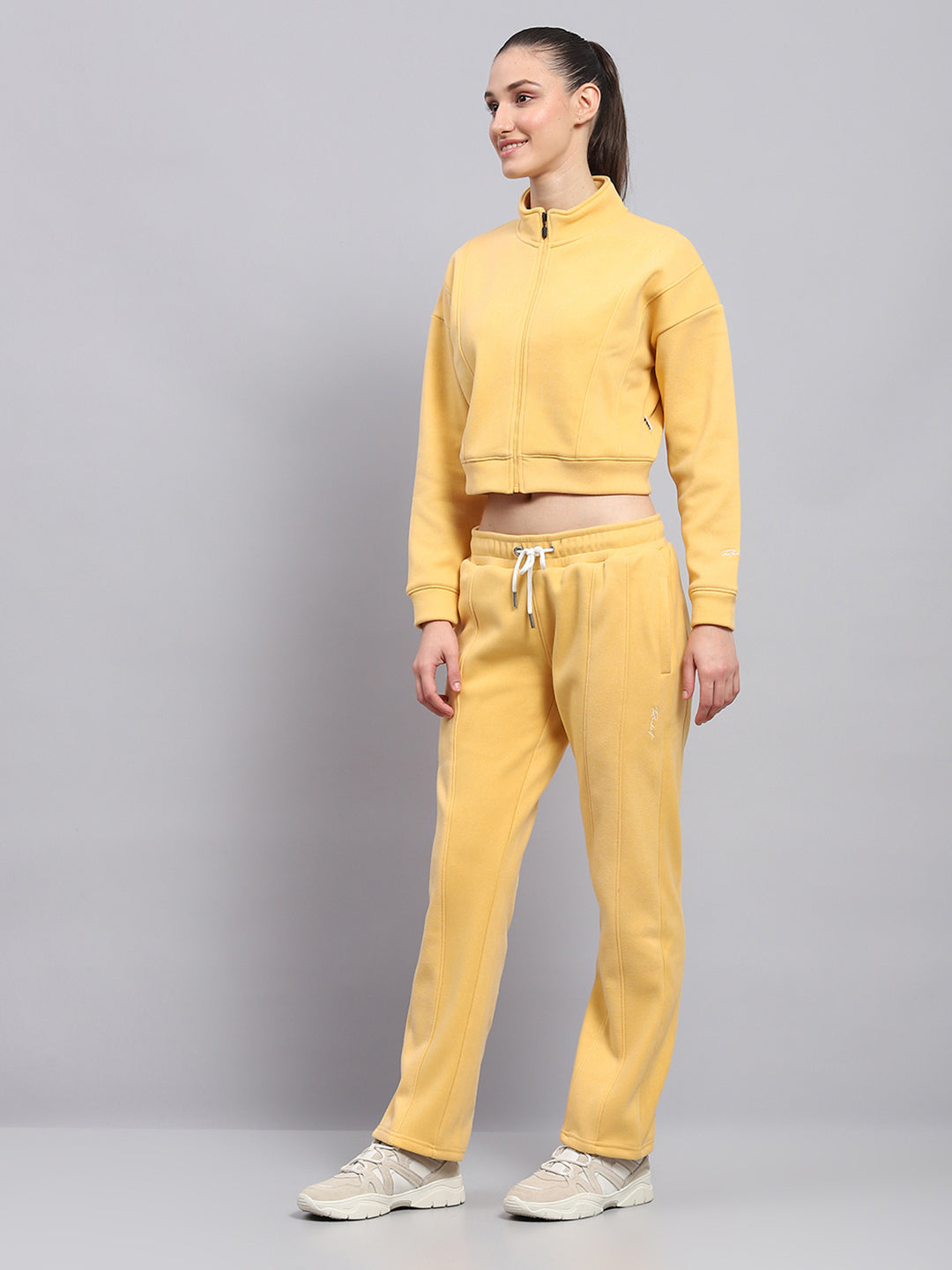 Women Yellow Solid Mock Neck Full Sleeve Tracksuit