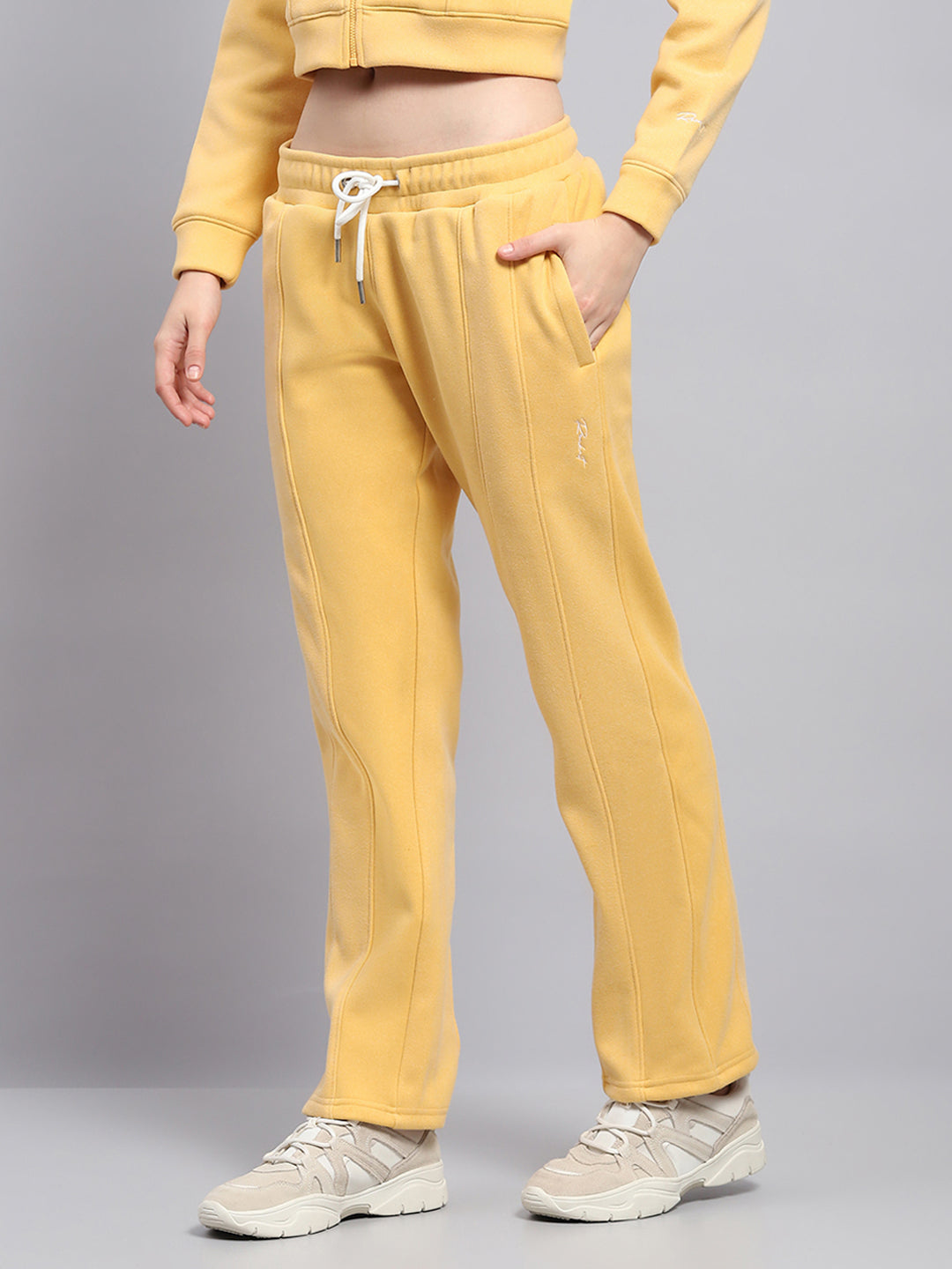 Women Yellow Solid Mock Neck Full Sleeve Tracksuit