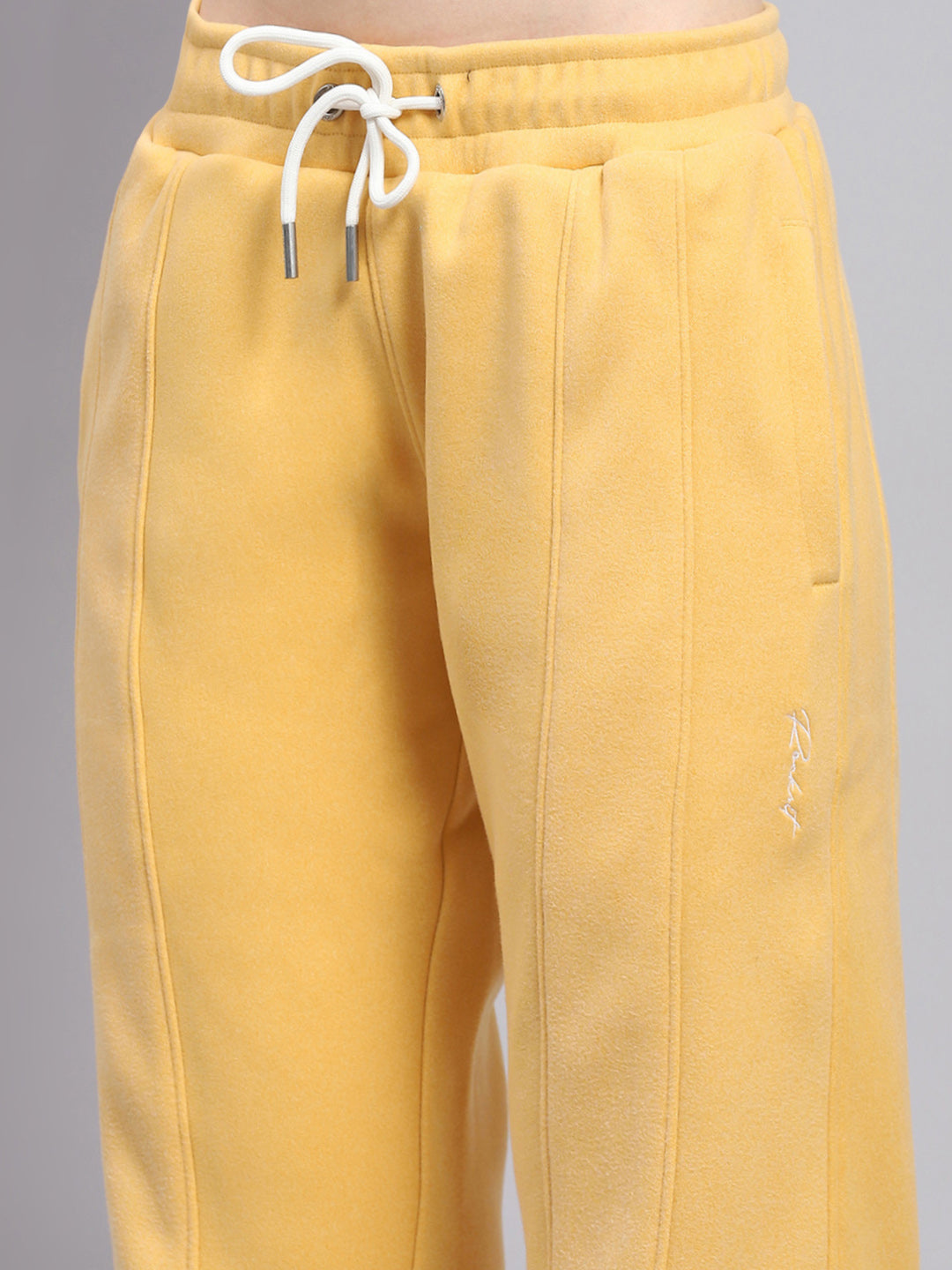 Women Yellow Solid Mock Neck Full Sleeve Tracksuit