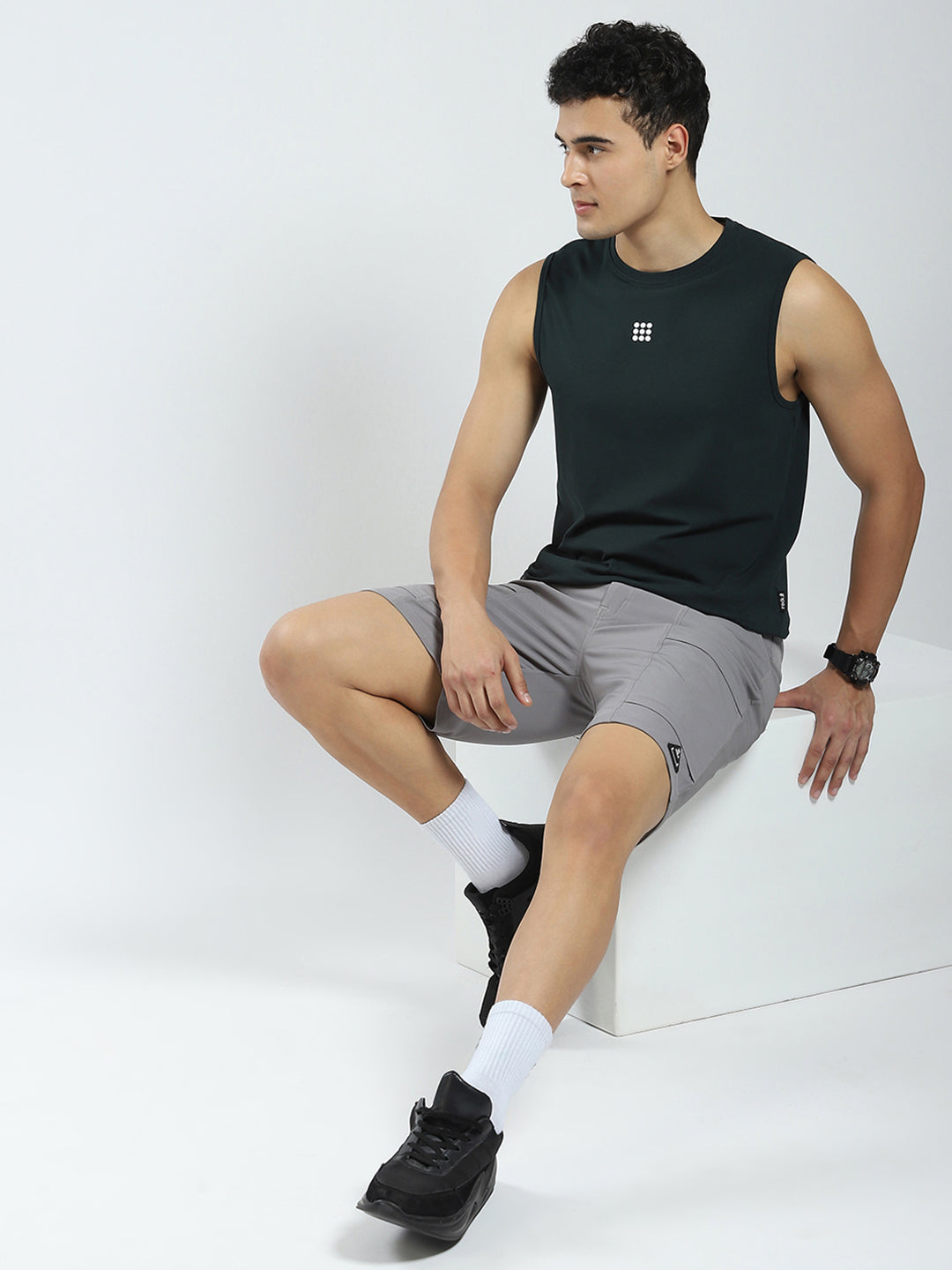 Men Teal Blue Solid Round Neck Sleeveless T-Shirt