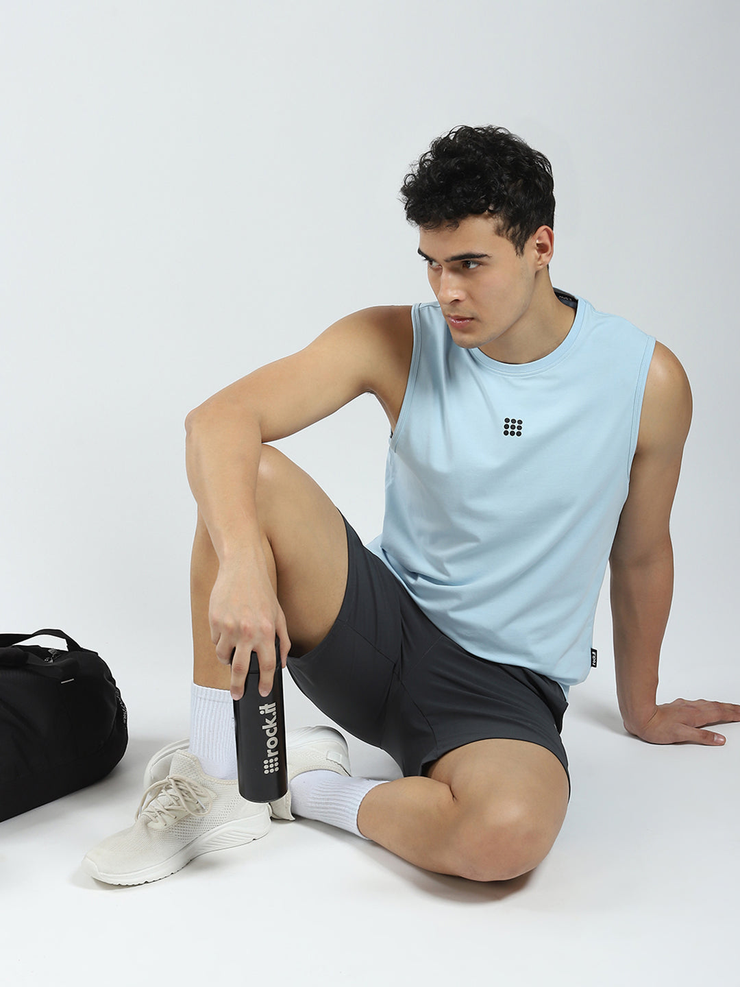 Men Blue Solid Round Neck Sleeveless T-Shirt