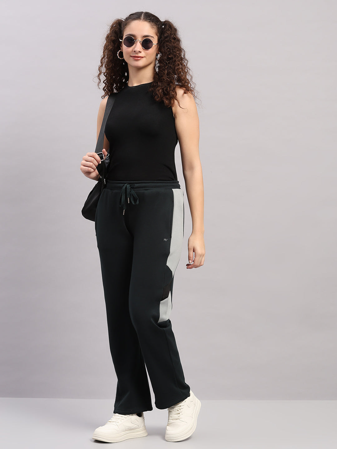 Women Dark Green Solid Regular Fit Winter Lower