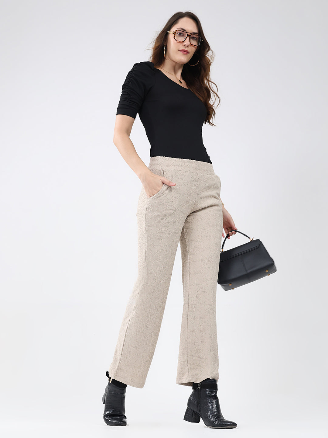 Women Beige Self Design Regular Fit Winter Lower