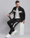 Men Black Solid Stand Collar Full Sleeve Tracksuit