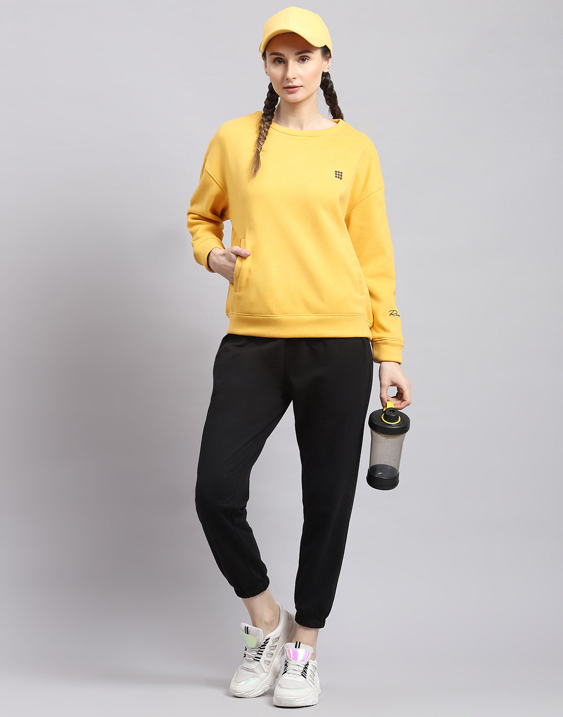 Women Yellow Solid Round Neck Full Sleeve Sweatshirt