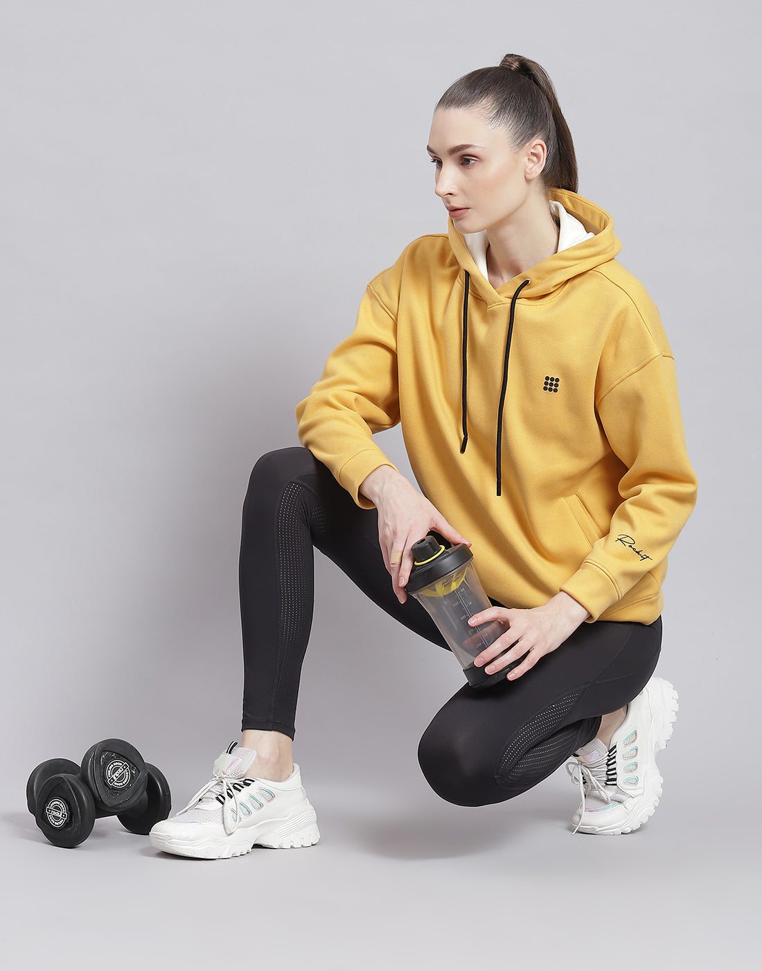 Women Yellow Solid Hooded Full Sleeve Sweatshirt