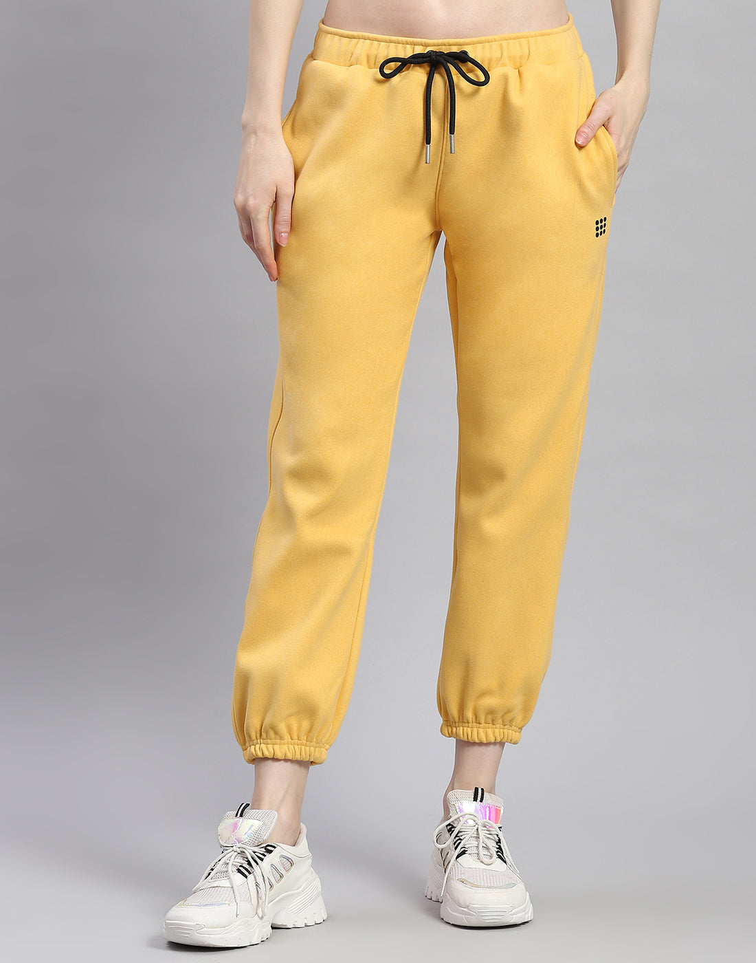 Women Yellow Solid Regular Fit Winter Lower