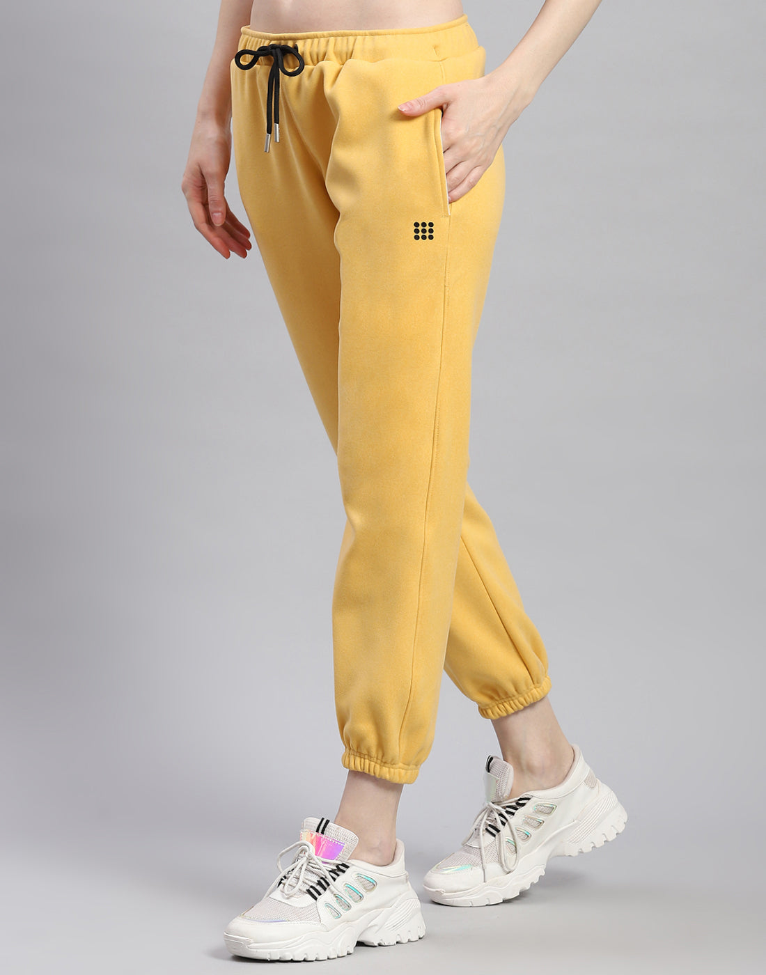 Women Yellow Solid Regular Fit Winter Lower