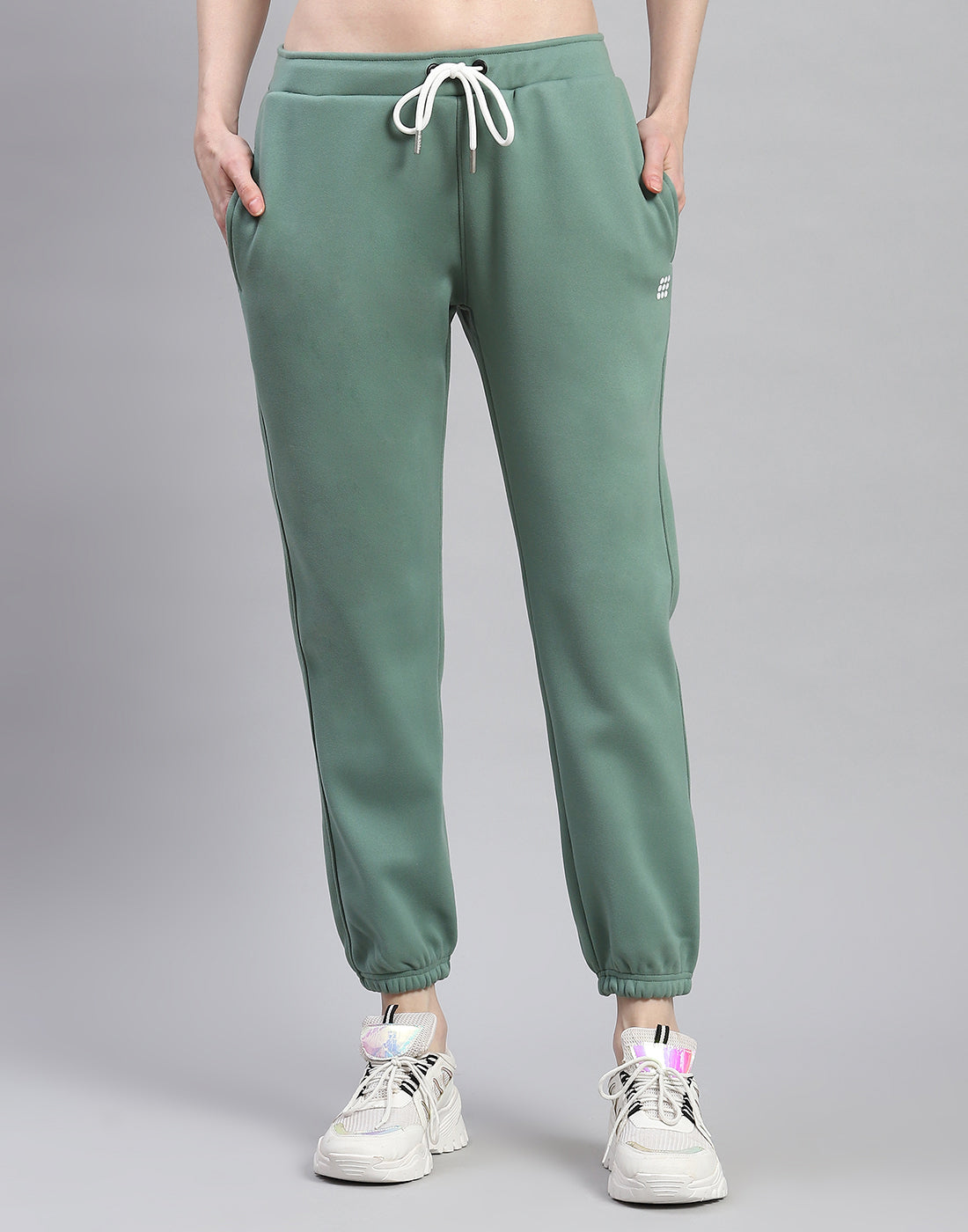 Women Green Solid Regular Fit Winter Lower