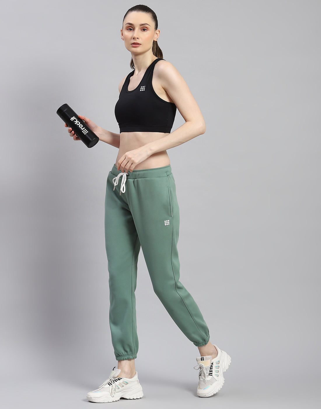 Women Green Solid Regular Fit Winter Lower