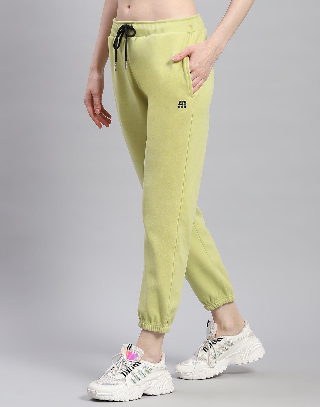 Women Green Solid Regular Fit Winter Lower