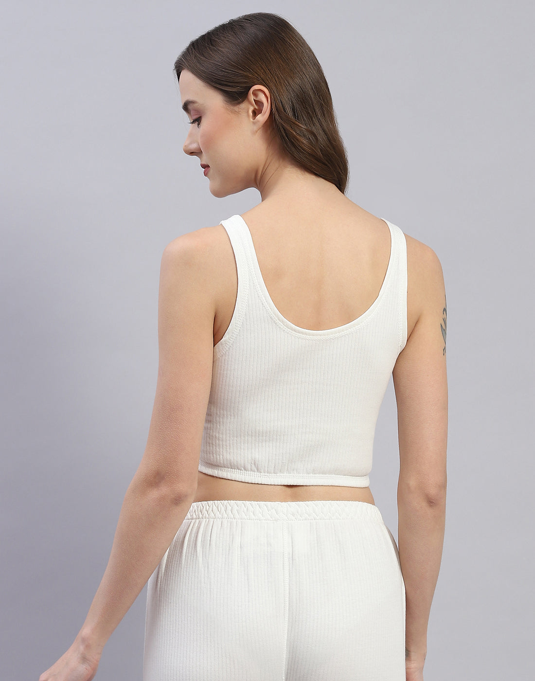 Women Off White Solid Round Neck Sleeveless Thermal Blouse